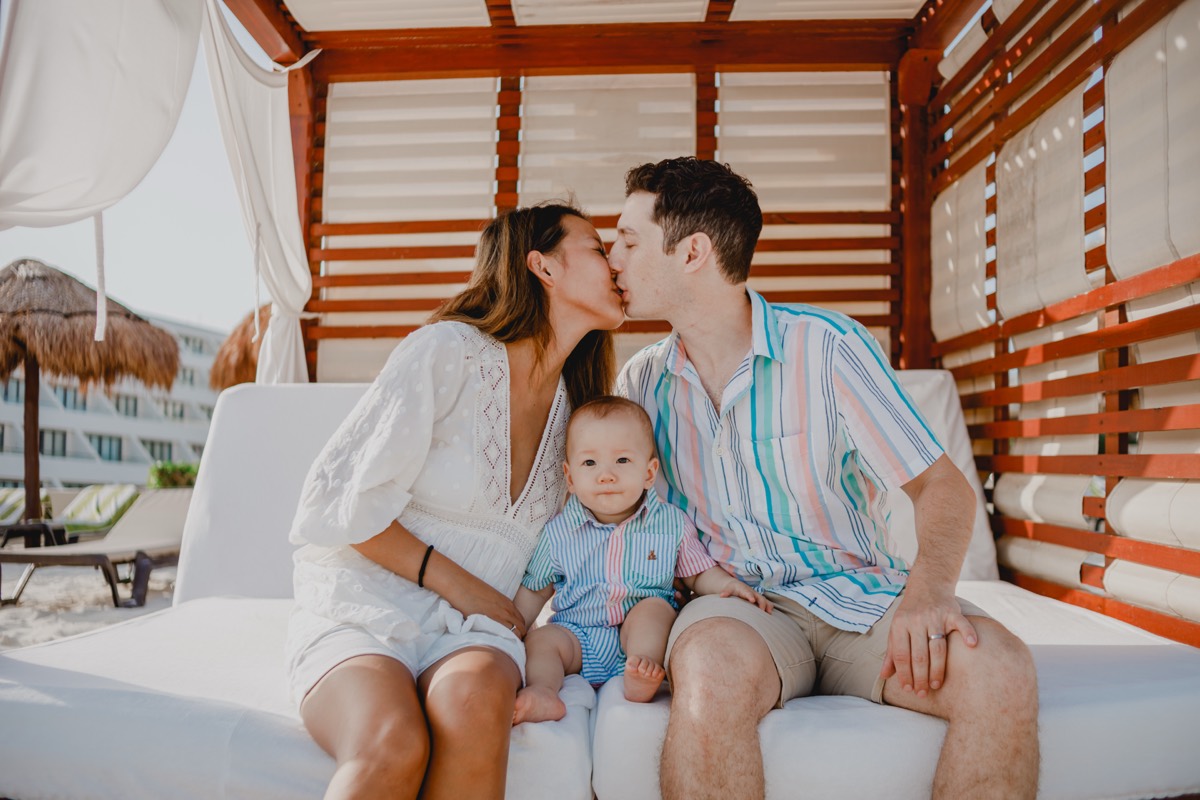 Family in a beach cabana, Cancún