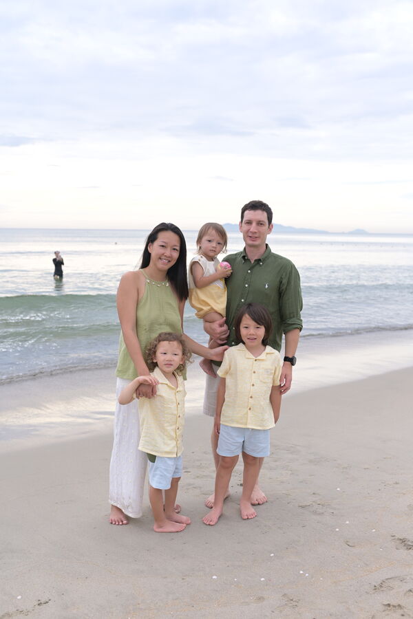 Family of five on the beach, Da Nang