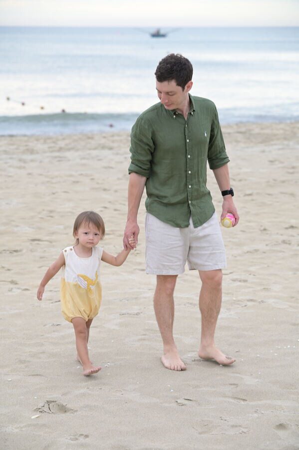 Dad and toddler on the beach, Da Nang