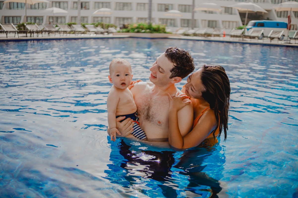 Family in the resort pool